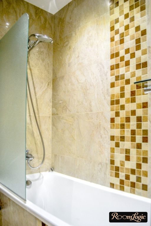 design of a small bathroom with sand-colored tile
