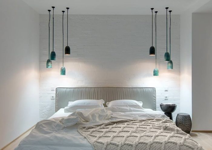 design of a small bedroom in a modern loft style