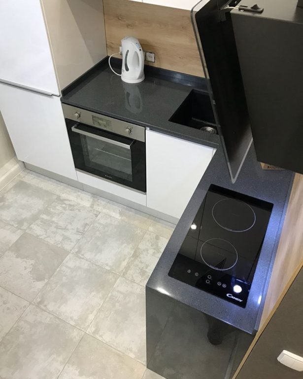 design of a small kitchen with a two-burner stove