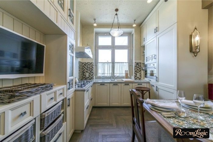 Design of a small U-shaped kitchen with a window