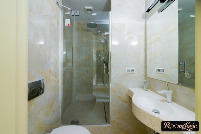 design of the bathroom with a homemade shower enclosure