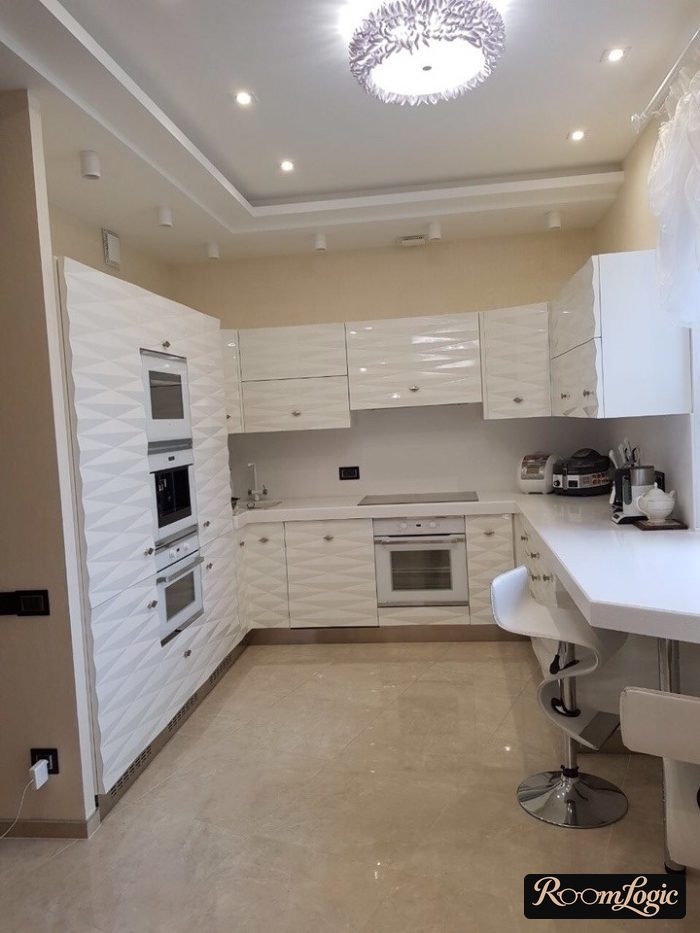 diagonal layout of large square tile on kitchen floor