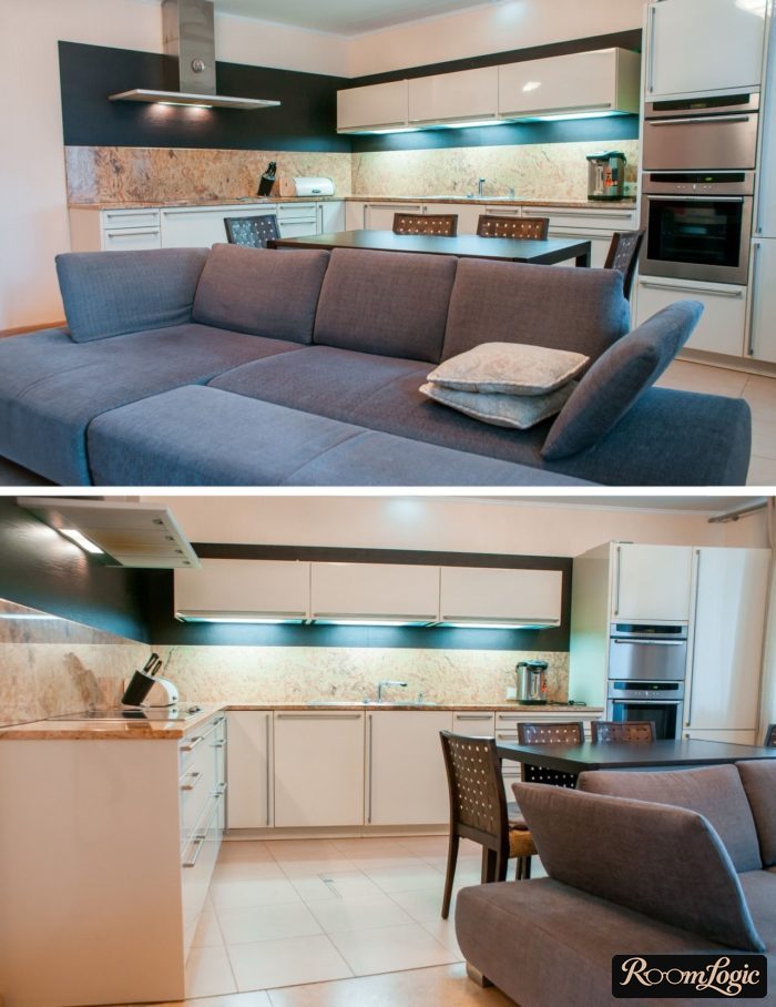 dining table and sofa in modern kitchen-living room