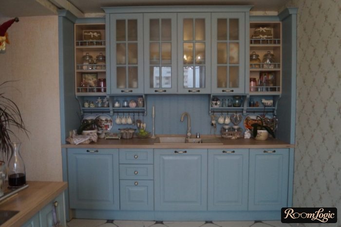 dusty blue kitchen cabinets with a Provence-style buffet