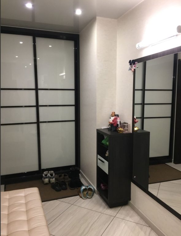 entryway with a bench