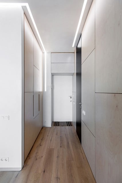 entryway with attic storage above the front door
