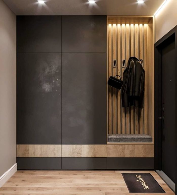 entryway with black and wood color combination