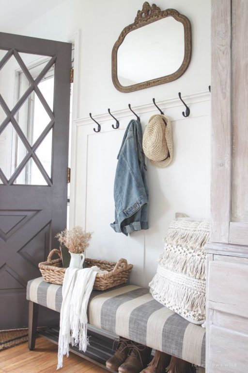 entryway with small mirror