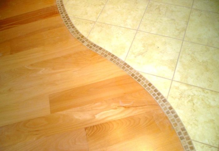 even joint between parquet and tile