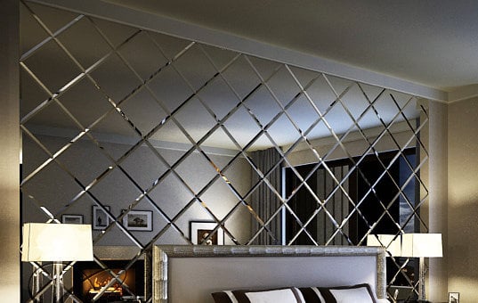 façeted mirror in bedroom