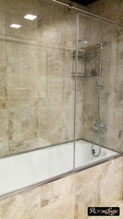 fashionable tile in very small bathroom