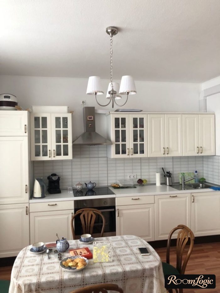 glass-door buffet on the kitchen