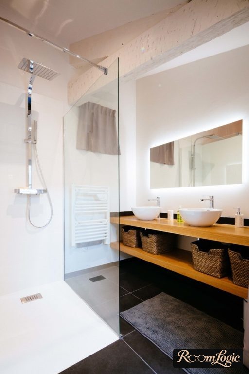 Glass shower curtain in a bathroom in a Scandinavian style