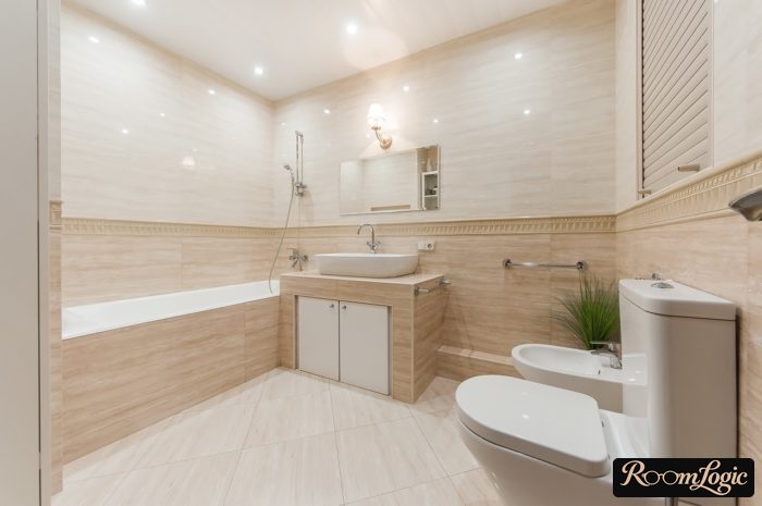 Glossy beige tile in the bathroom