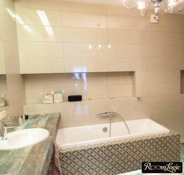 Glossy milk-colored rectangular tile in the bathroom