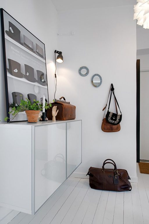 Glossy vanity next to the door