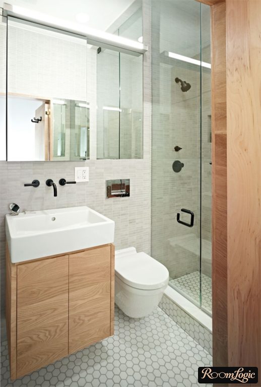 gray and wood in the bathroom of a tiny apartment