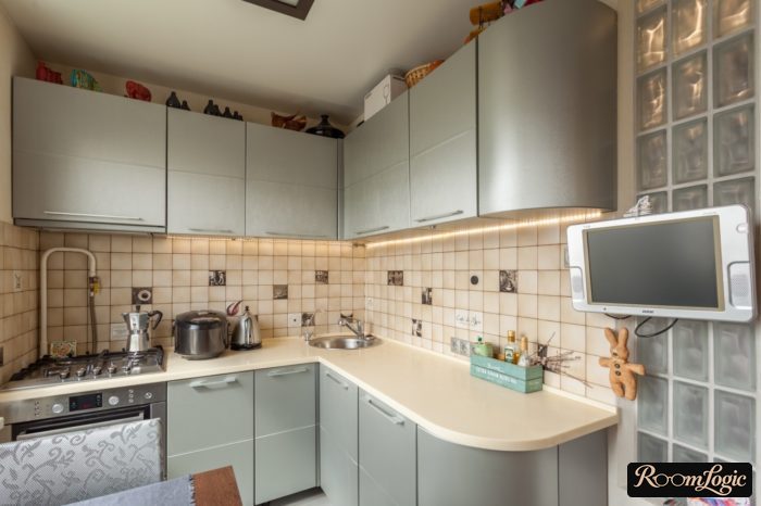 gray corner kitchen in a tiny apartment