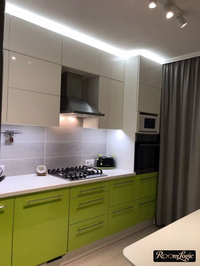 gray curtains in a green kitchen