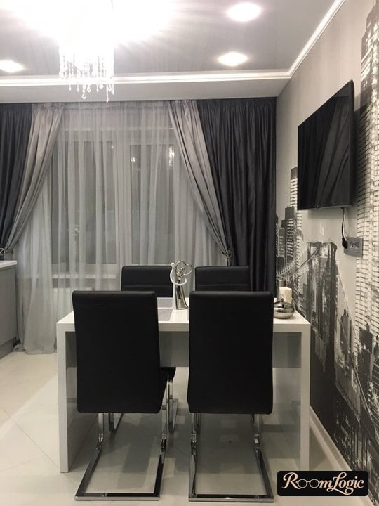 gray curtains in a modern kitchen with a balcony door