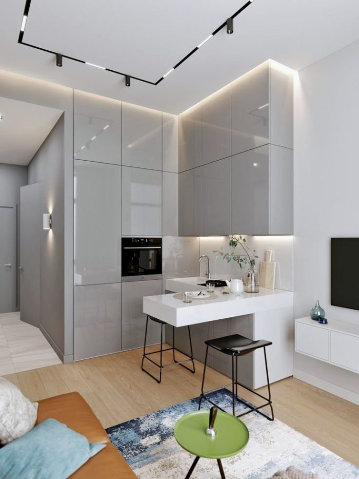gray glossy kitchen-living room suite in minimalism style
