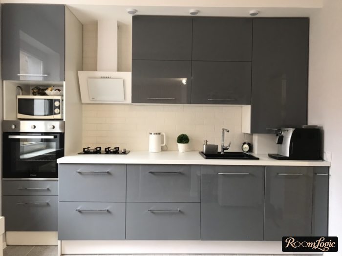 gray glossy kitchen with white backsplash