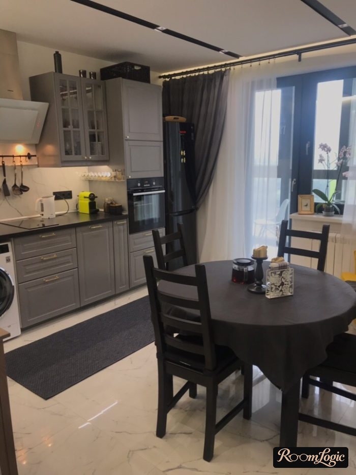 gray kitchen with gray curtains