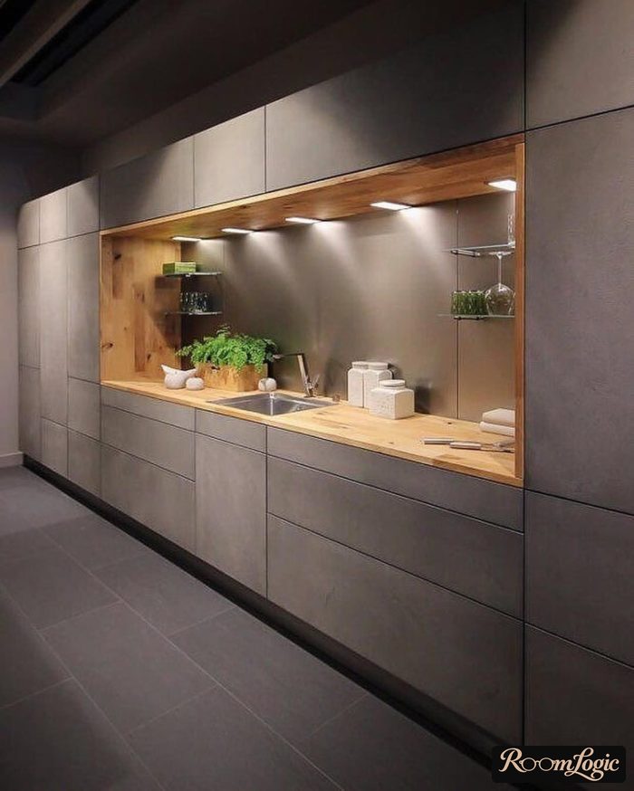 gray kitchen with wood to the ceiling in loft style