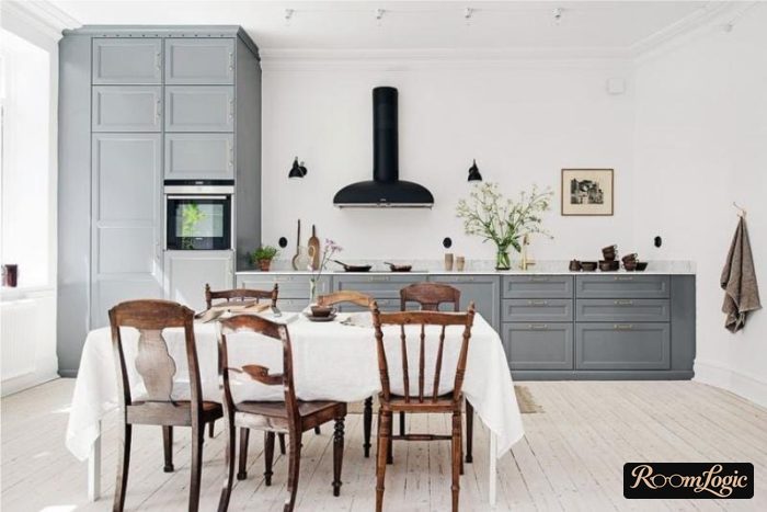 gray kitchen without upper cabinets with tech drawer