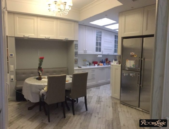 gray laminate on the floor in the kitchen-dining room