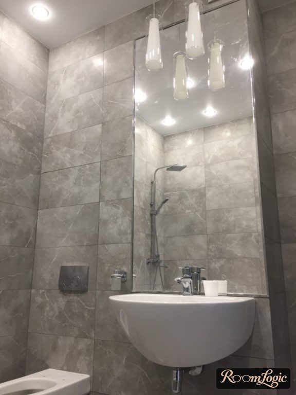 gray marble-look tile in the toilet