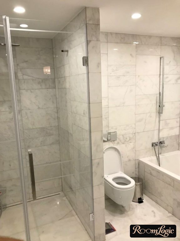 gray marble on the floor and walls in the shower