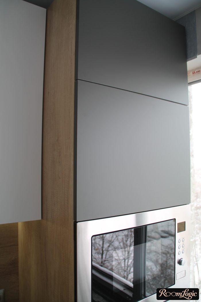 Gray matte cabinet fronts and wood in the kitchen