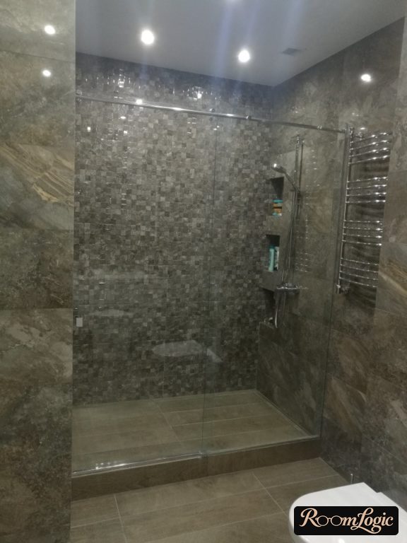 gray mosaic tile in loft style in the shower
