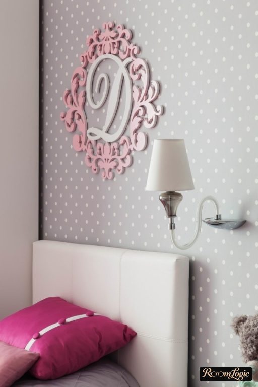 Gray polka-dot wallpaper in a kids' room