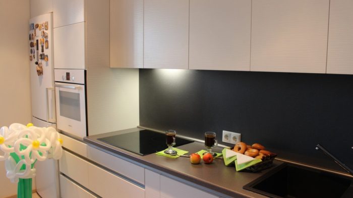 gray postformed kitchen wall panels