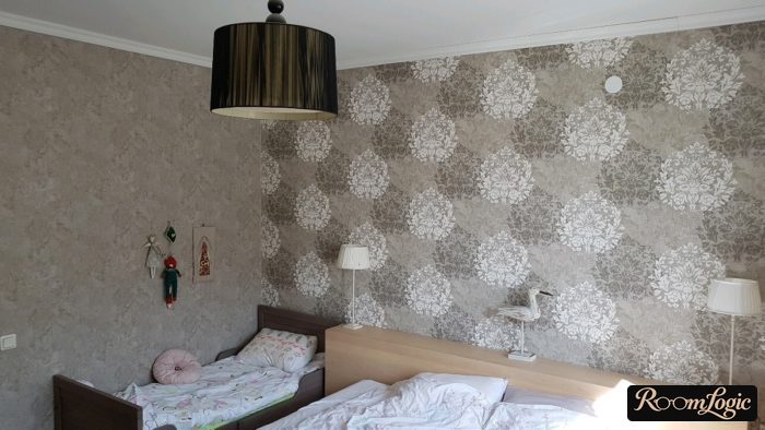 Gray wallpaper in a two-in-one bedroom and kids' room