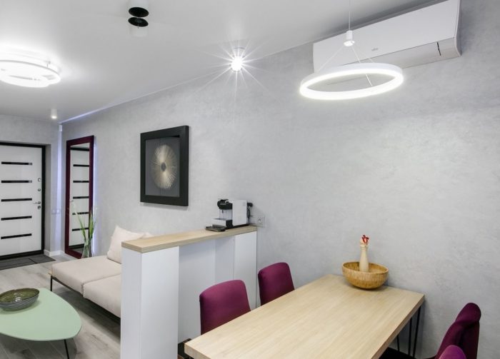 gray walls and floor in the studio apartment design