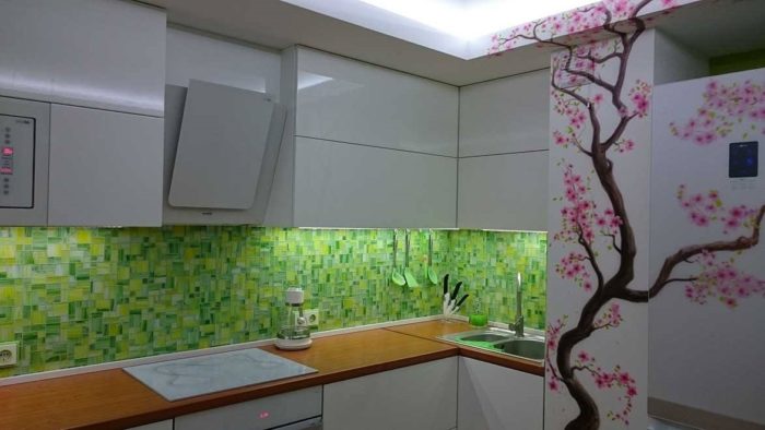 green backsplash in white kitchen