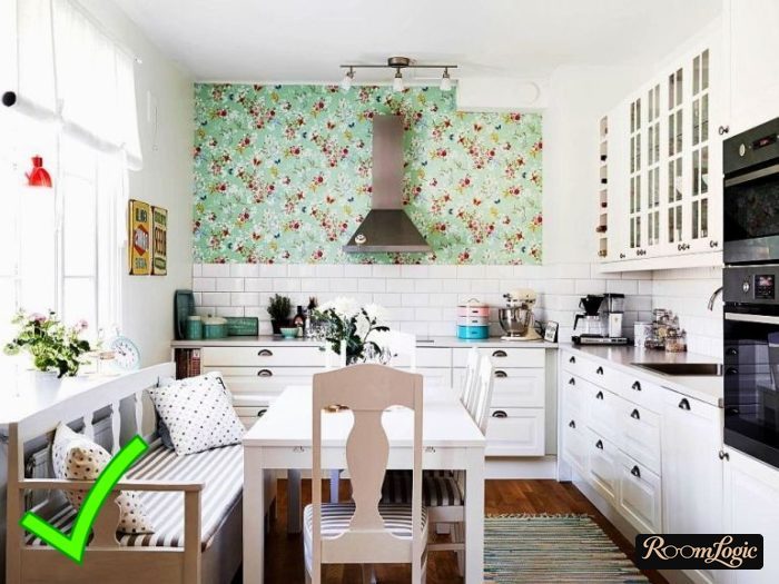 green wall paper with floral pattern