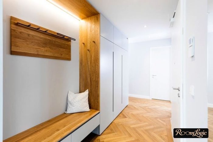 hallway closet design with bench and narrow shoe drawers