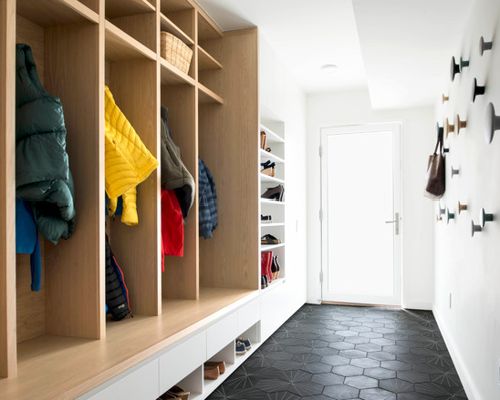 Hallway with an open multi-section wardrobe