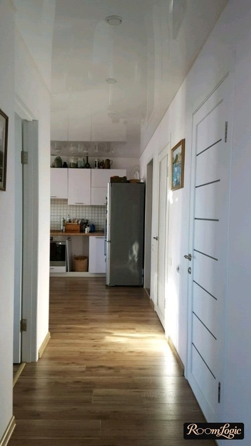 hallway with white glossy ceiling