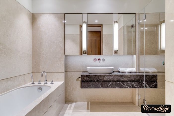 hanging vanity with basin and built-in faucet in bathroom
