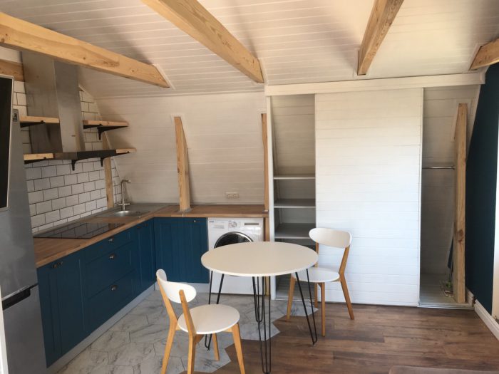 hexagonal tile and parquet in a Scandinavian kitchen