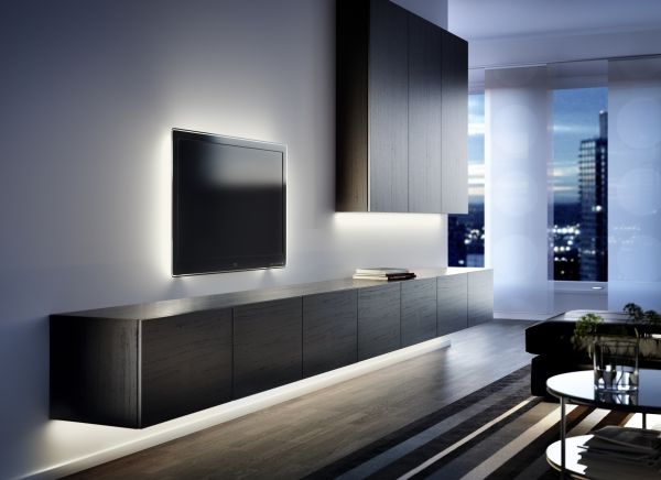 hidden lighting behind the TV and under the vanity