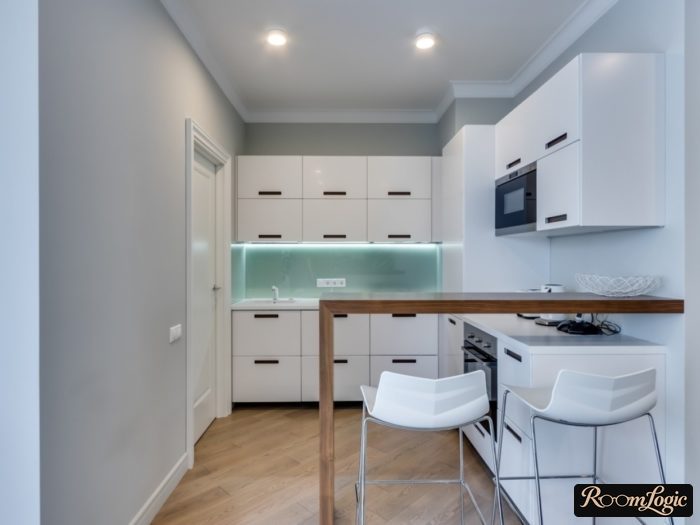 High breakfast bar between kitchen and living room