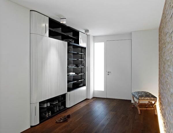 High hinged wardrobe in entryway interior