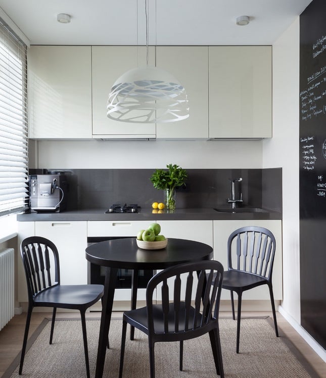 hinged front doors reaching to the ceiling in the kitchen