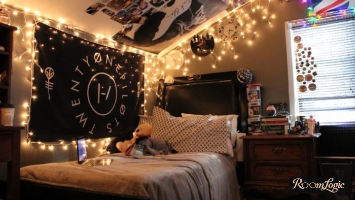 Informal decoration of a teenage girl's room with photos and string lights
